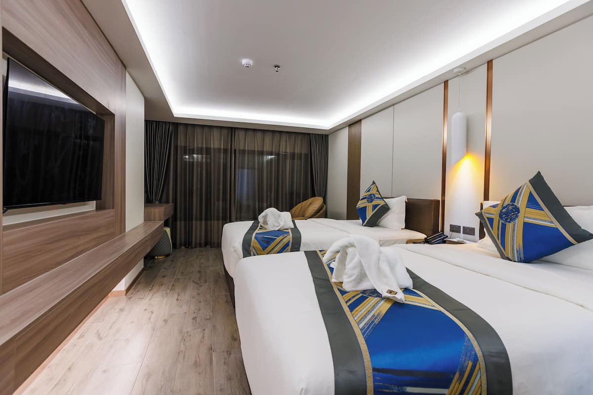 Economy Condo | Premium bedding, desk, laptop workspace, blackout drapes