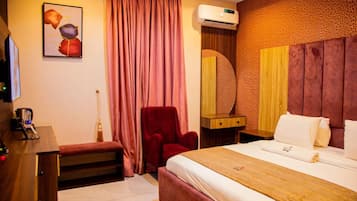 Deluxe Room, Balcony, City View | Desk, laptop workspace, blackout curtains, soundproofing
