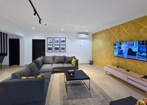 Family Room, Balcony, City View | Living area - Asabana Suites And Hotel (Enugu)