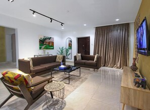 Family Room, Balcony, City View | Living area - Asabana Suites And Hotel (Enugu)