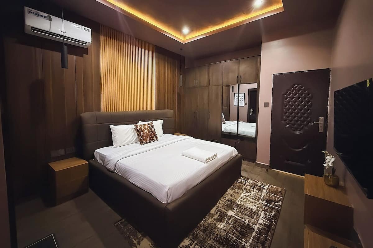 Economy Room, Balcony, City View | Desk, laptop workspace, blackout drapes, soundproofing