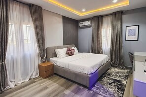 Family Room, Balcony, City View | Desk, laptop workspace, blackout curtains, soundproofing