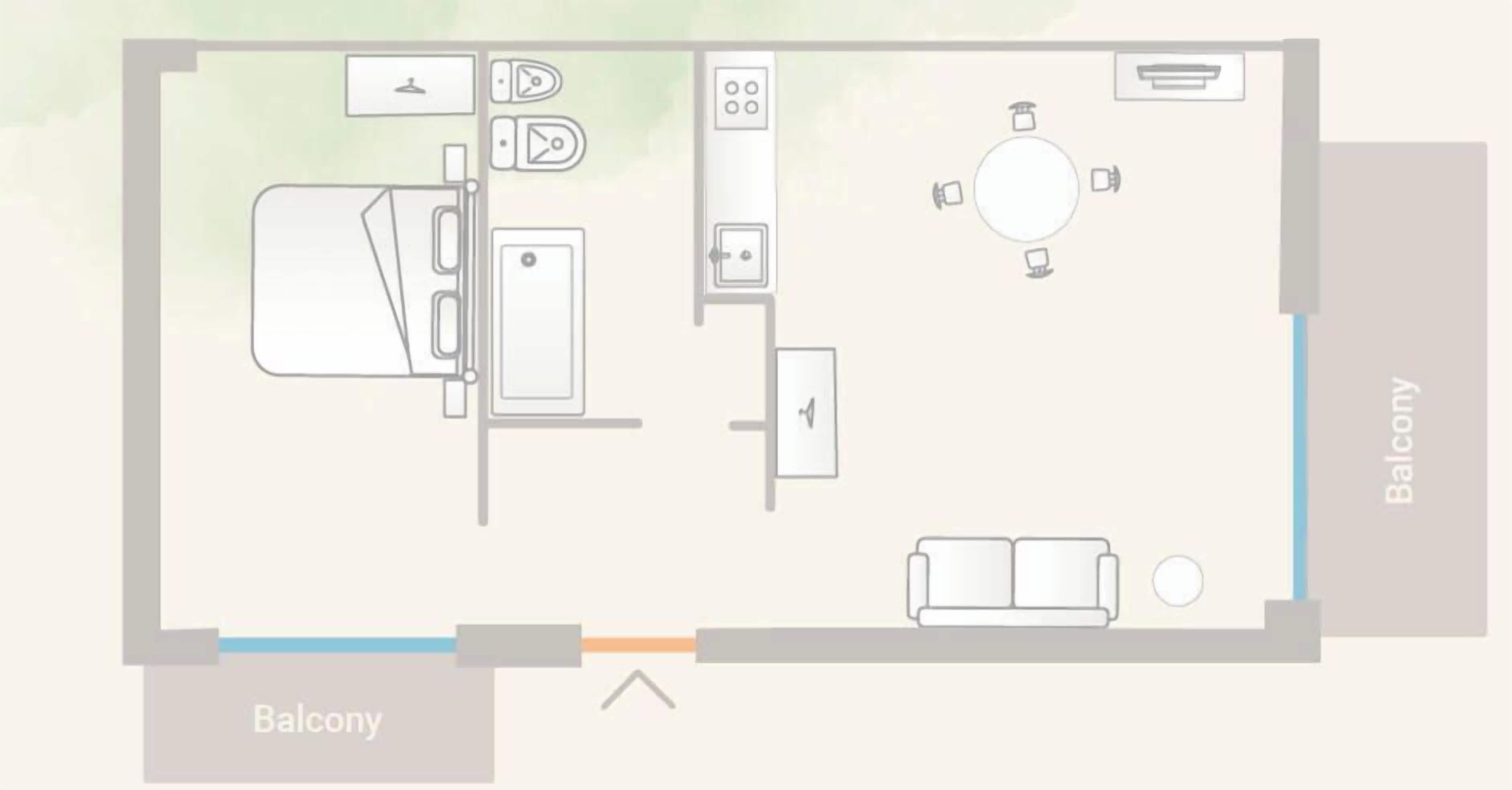 A room with a bed, a desk, a chair, a small table, and a window.