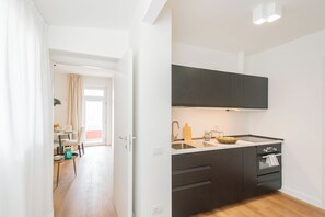Apartment (1 Bedroom) | Private kitchen | Oven, espresso maker, electric kettle, highchair