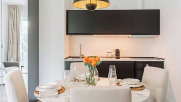 Apartment (1 Bedroom) | Private kitchen | Oven, espresso maker, electric kettle, highchair