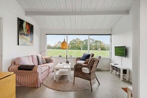 Living area - Sct. Knudsborg · Cottage 12J · Covered terrace, sea panorama · sleeps 4 (Middelfart)