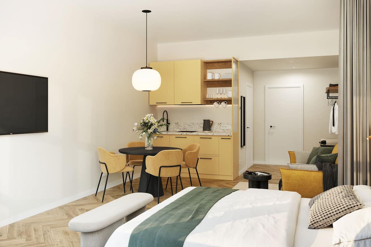Signature Studio | Desk, laptop workspace, iron/ironing board, free cribs/infant beds