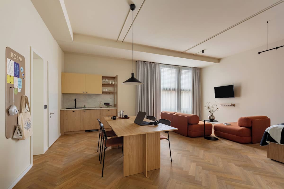 Signature Studio | Desk, laptop workspace, iron/ironing board (on request), cribs (free)