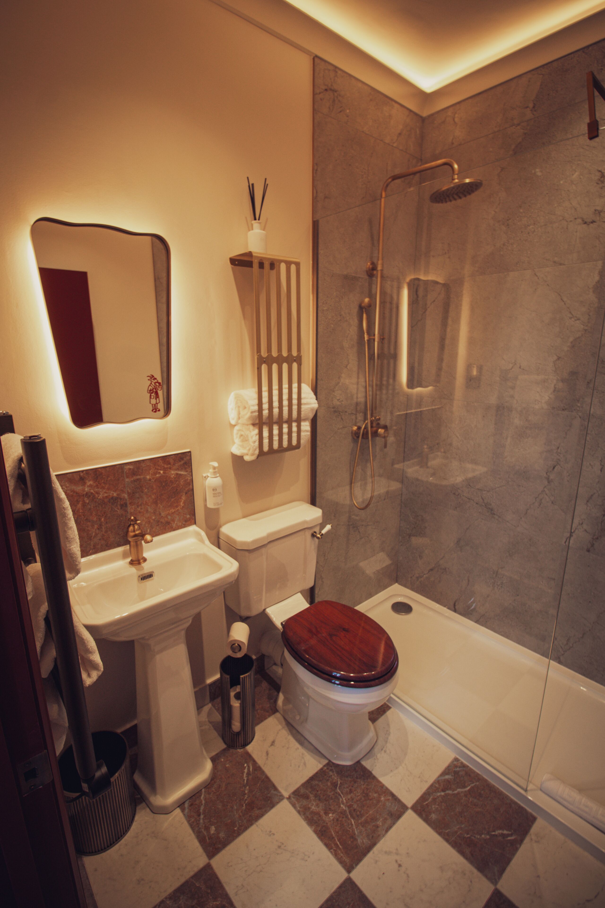 Shower, rainfall showerhead, hair dryer, towels