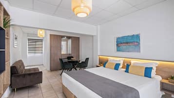 Apartamento, 1 cama doble con sofá cama, balcón, vistas a la ciudad | Caja fuerte, tabla de planchar con plancha, wifi gratis