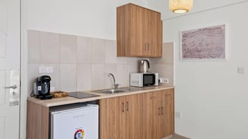 Apartamento Confort, balcón, vistas a la ciudad | Cocina privada