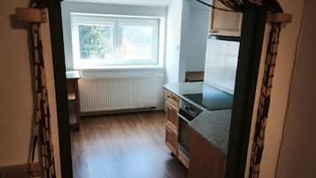 Family Apartment, Hill View | Private kitchen | Highchair