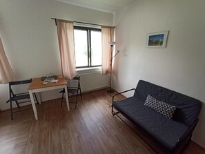 Quarto casal standard | Área de estar