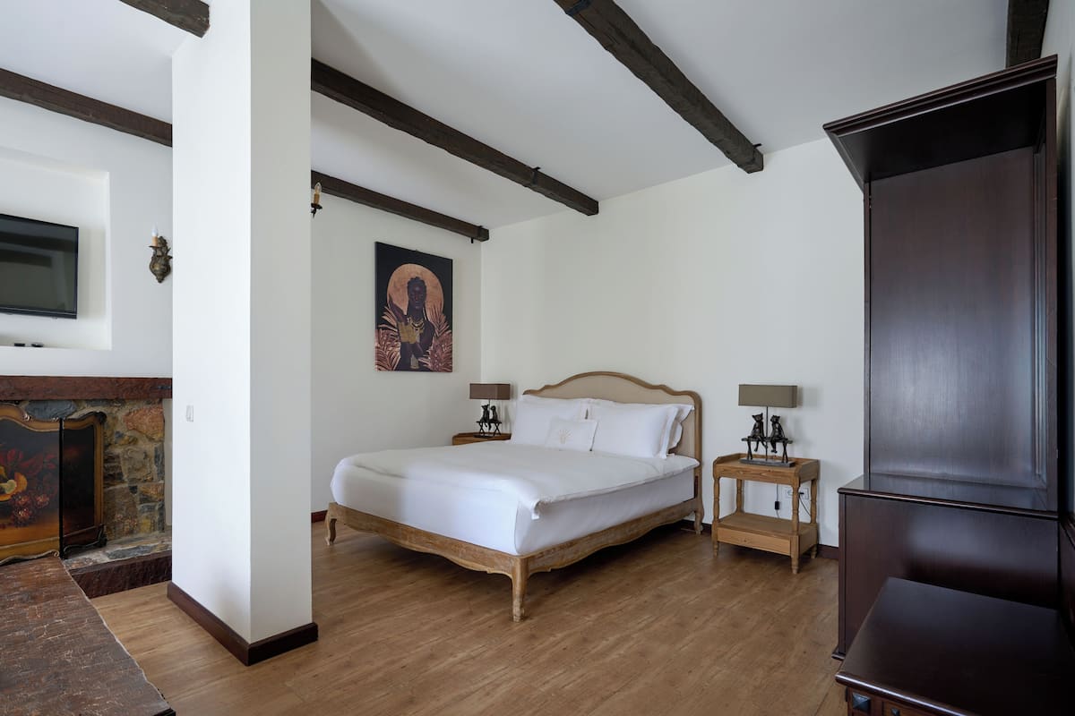 Habitación doble Deluxe, vista al jardín | Minibar, wifi gratis y ropa de cama