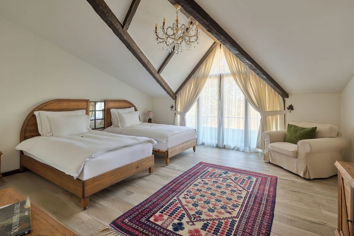 Habitación Deluxe con 2 camas individuales, balcón, vista al valle | Minibar, wifi gratis y ropa de cama