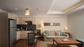 A modern apartment with a kitchen, dining area, and living room. - ICONIA Zamalek (Zamalek)