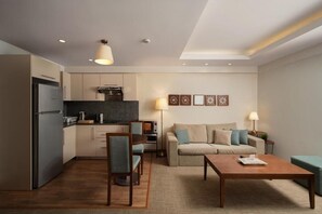 A modern apartment with a kitchen, dining area, and living room. - ICONIA Zamalek (Zamalek)