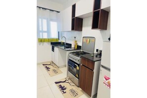 Private kitchen - Modern Executive Studio on Ngong Road – Work-Ready & Cozy City Stay (Starehe)