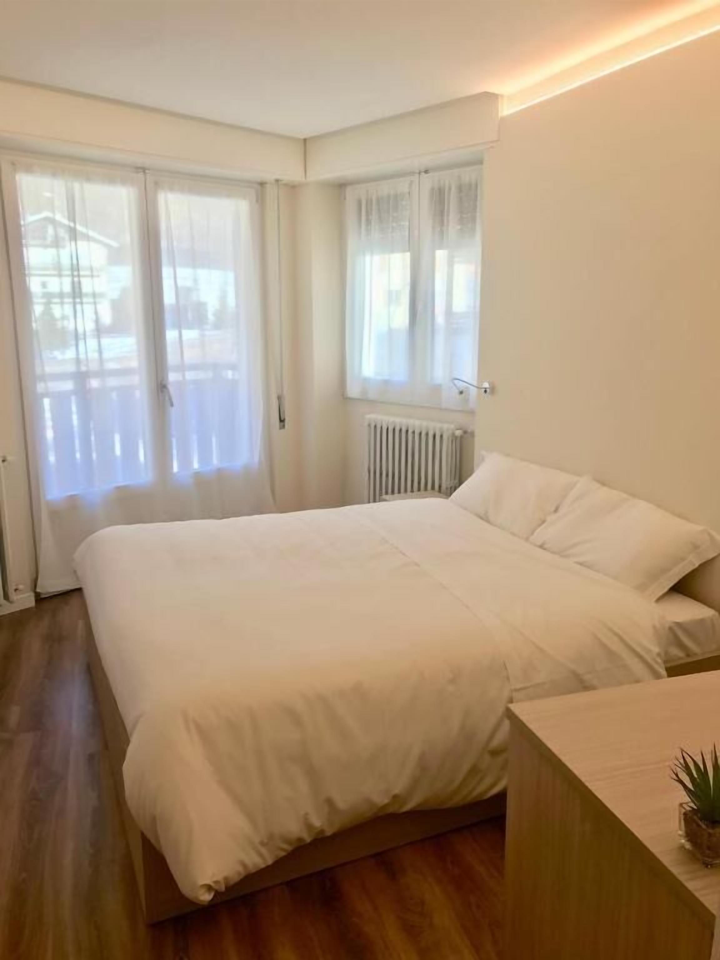 Family Room, Balcony, City View | Free WiFi
