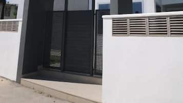 A modern building with the name 'BRAVOSOL' on the facade.