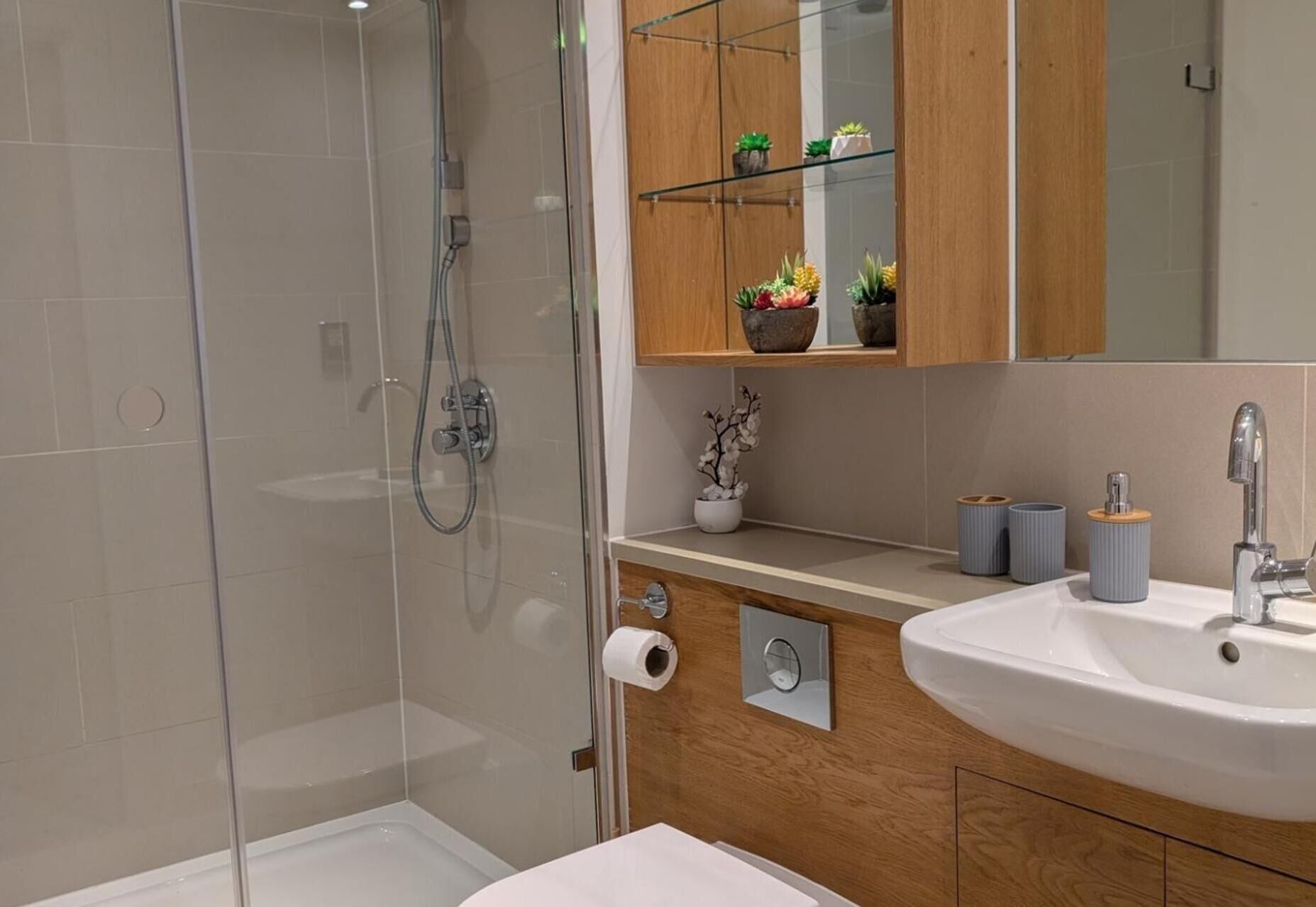 Combined shower/bathtub, deep-soaking bathtub, towels