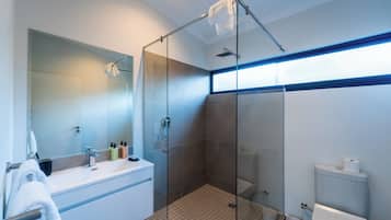 Deluxe Apartment, Patio | Bathroom | Shower, hair dryer, towels, soap