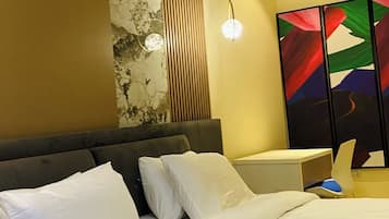 Deluxe Apartment, Balcony, City View | In-room safe, desk, laptop workspace, blackout drapes