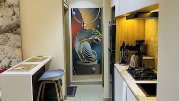 Deluxe Apartment, Balcony, City View | Private kitchen | Fridge, microwave, oven, stovetop