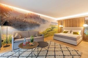 Suíte superior | Roupas de cama premium, frigobar, cofres nos quartos, cortinas blackout