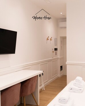 Habitación básica con 1 cama matrimonial o 2 individuales, vista a la ciudad | Wifi gratis 