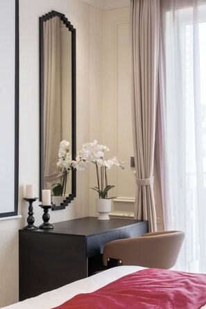 Luxury Suite, Balcony, City View | In-room safe, desk, laptop workspace, blackout curtains