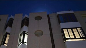 A building with multiple windows and a flat facade. - Private Beach Apartment WiFi- MorroJable- 2 Bedrooms (Morro Jable)
