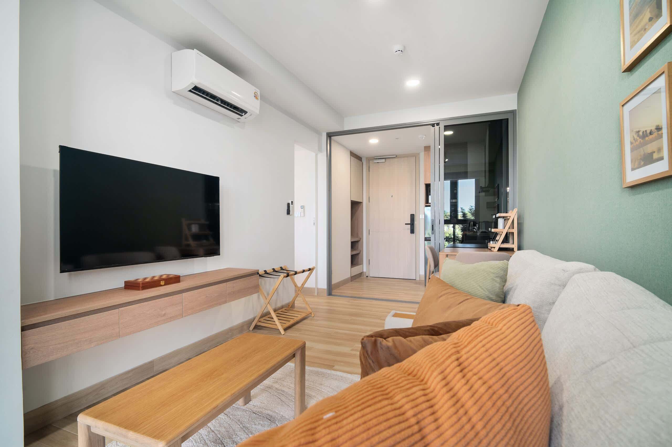 One Bedroom 1Cx Deluxe | Living area | 43-inch Smart TV with digital channels