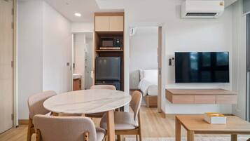 Two-Bedroom 2Ax Deluxe | Living area | 43-inch Smart TV with digital channels