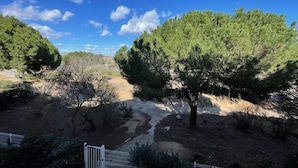 A natural landscape with trees and a dirt path. - Practical studio with parking - 4 guests (Cap d'Agde)