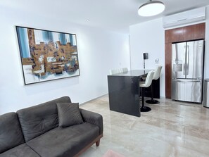Living area - Refined Comfort: Exclusive 1-Bedroom Escape (PLAYA DEL CARMEN)