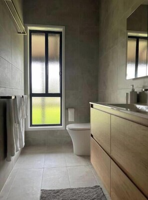 Hair dryer, towels, soap, toilet paper - Tranquil Enclave
close to amenities. (Table Top)