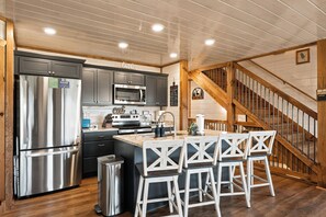 Coffee/tea maker, fridge, microwave, oven