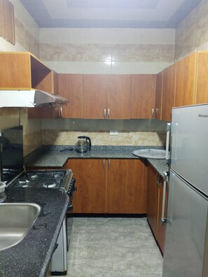 Private kitchen - Nice 2-bedroom apartment with AC in vibrant Cairo Governorate (Cairo Governorate)