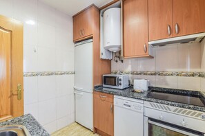 Deluxe Apartment, Balcony | Private kitchen - Retiro VIII (Madrid)