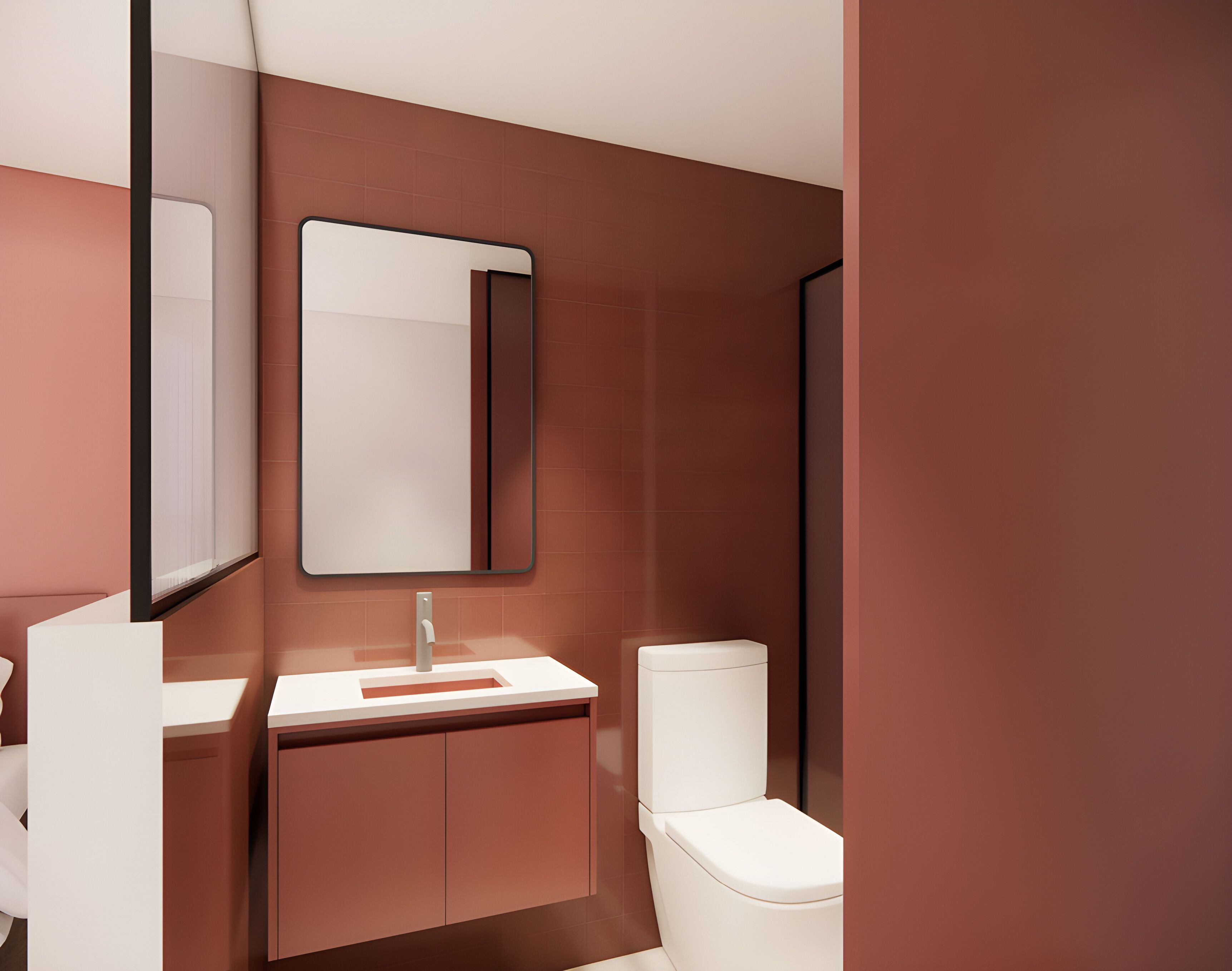 Ein modernes Badezimmer mit Waschbecken, Spiegel und Toilette.