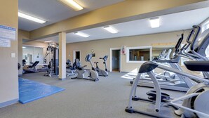 A gym with exercise equipment, a blue mat, and a sign with rules. - < 1 Mi to Granby Rodeo! Retreat w/ Pool & Hot Tub (Granby)
