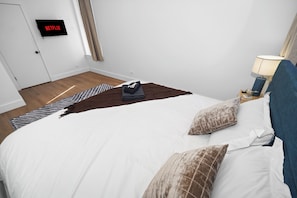 Iron/ironing board, travel crib, free WiFi, bed sheets