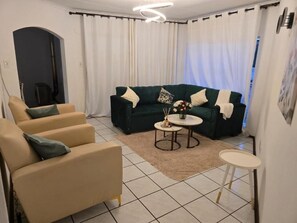 Dormitorio compartido, 1 habitación | Sala de estar