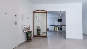 A modern kitchen with stainless steel appliances, a dishwasher, and a built-in oven. - Paloma Central Apartment (Nerja)