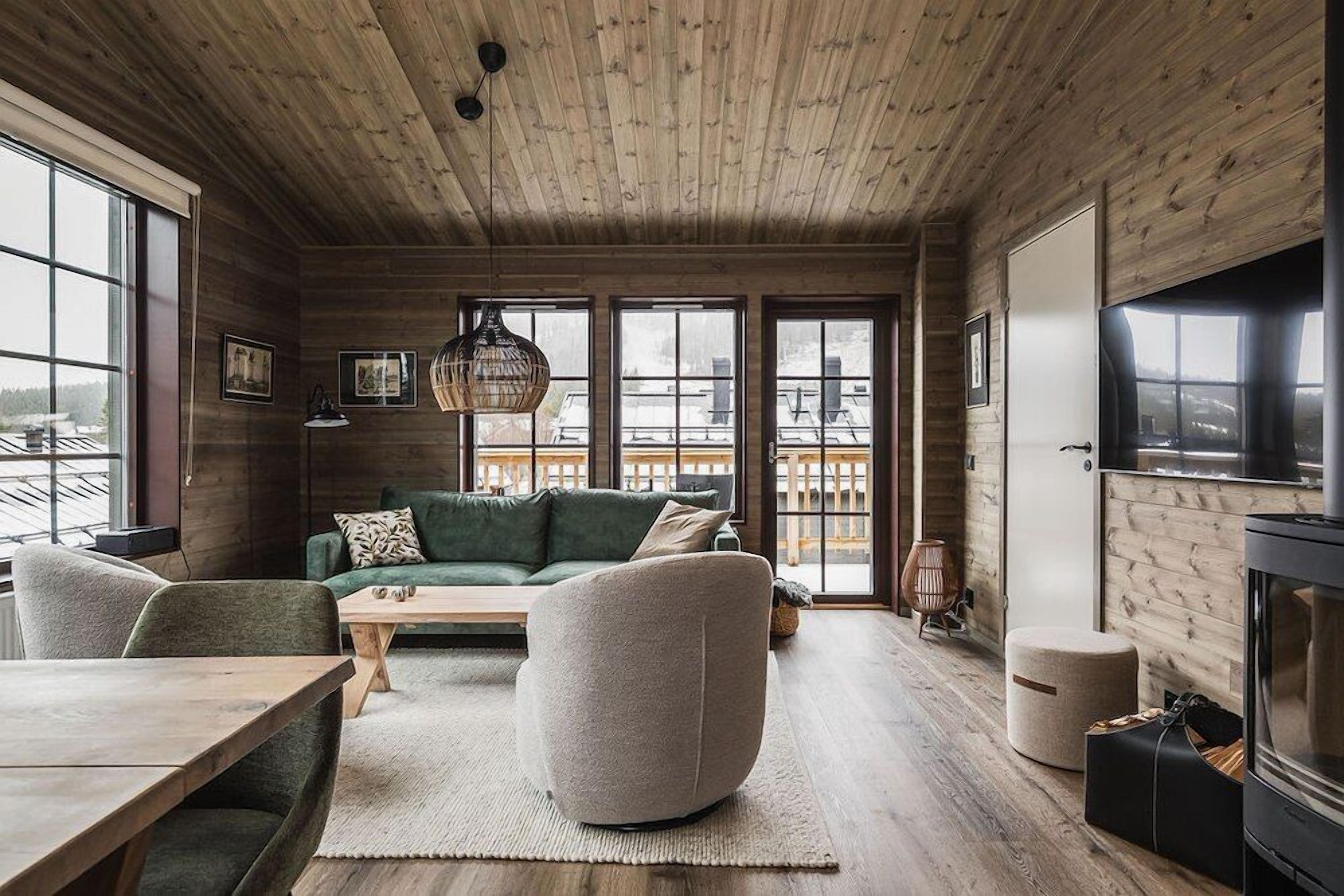 Apartamento, 3 habitaciones, sauna, vistas a la montaña | Zona de estar | Una televisión de pantalla plana