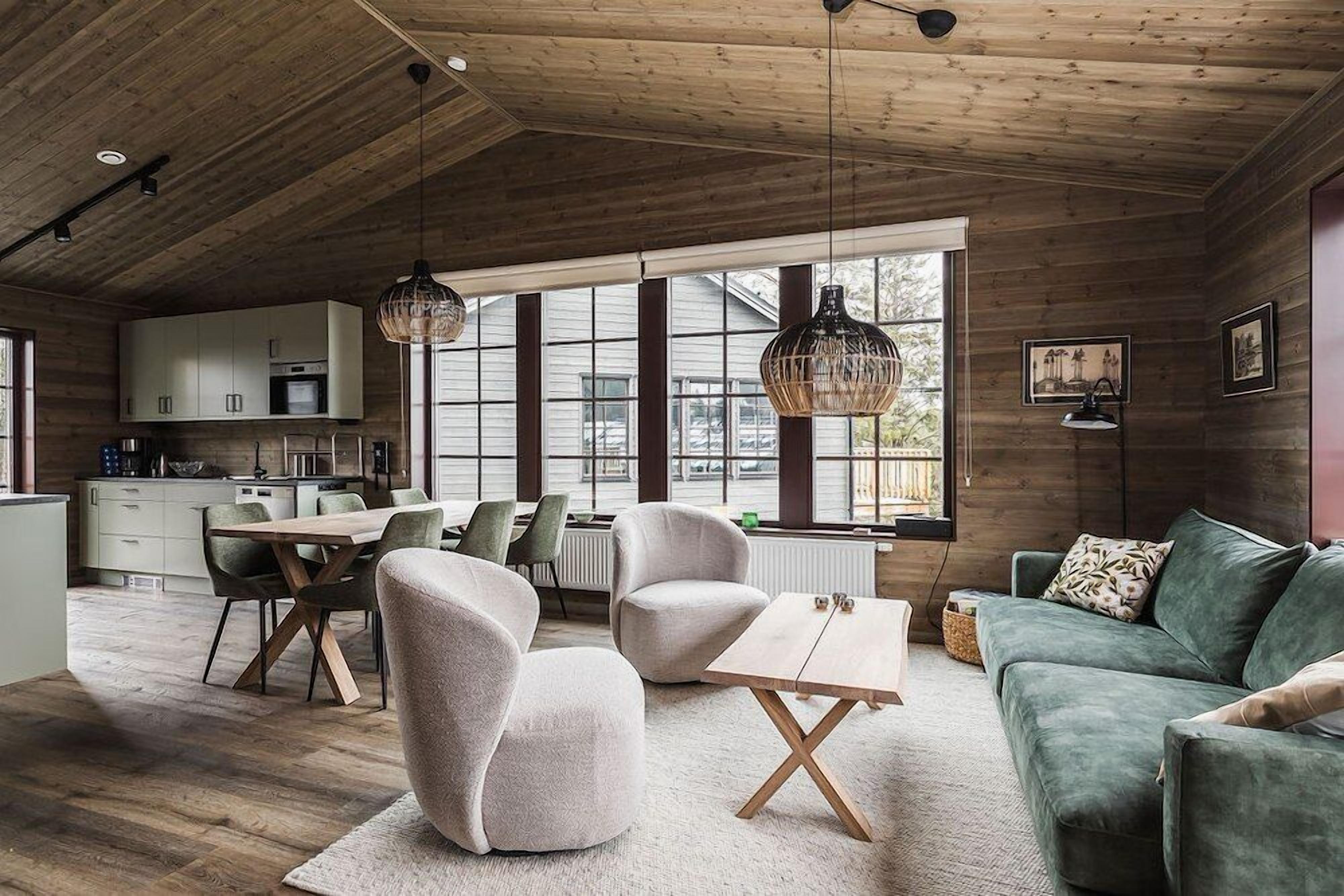Apartment, 3 Bedrooms, Sauna, Mountain View | Living area | Flat-screen TV