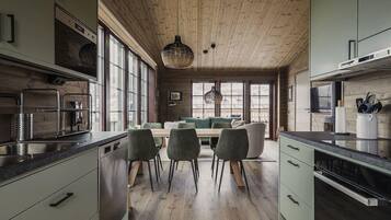 Apartment, 3 Bedrooms, Sauna, Mountain View | Living area | Flat-screen TV