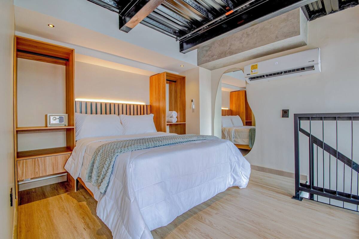 Apartment | Down comforters, in-room safe, desk, blackout drapes