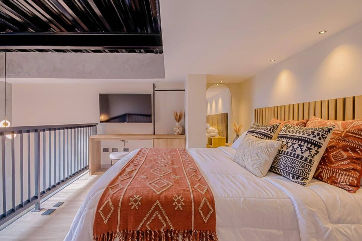 Apartment | Down comforters, in-room safe, desk, blackout drapes